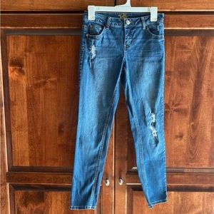 Size 12 girls Justice super skinny jeans.